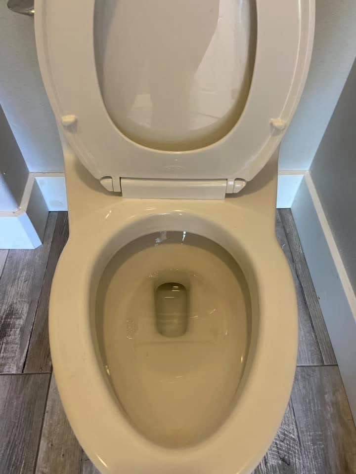 Spotless commercial bathroom with double sinks